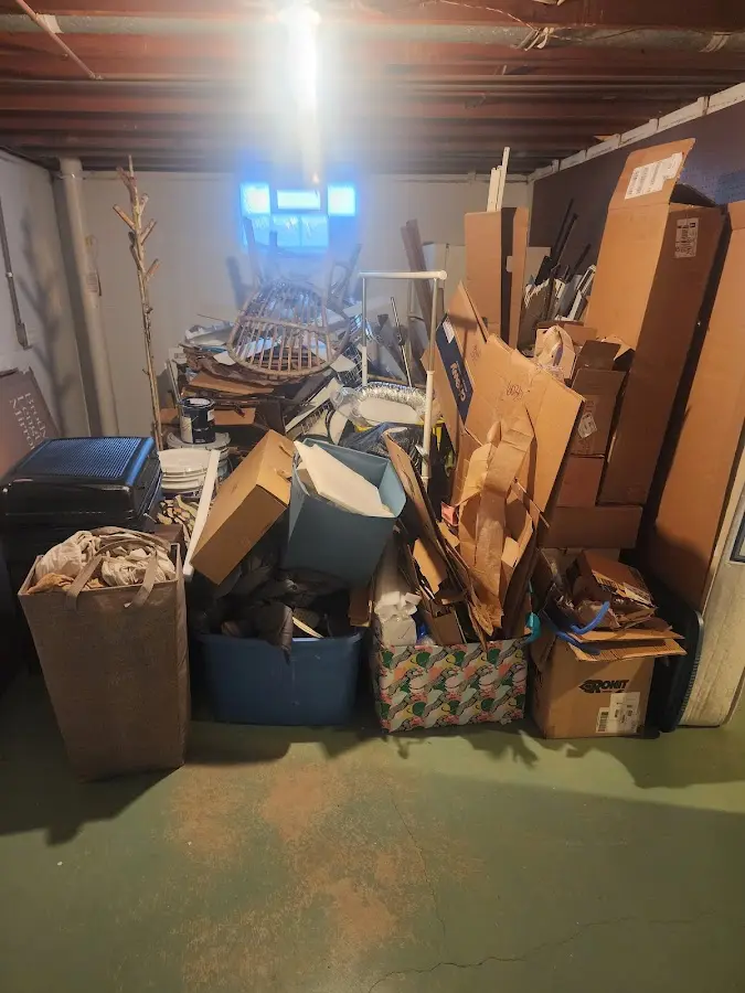 Roll-off dumpster container at job site for 2 Yard Dumpster Rental in DeCordova